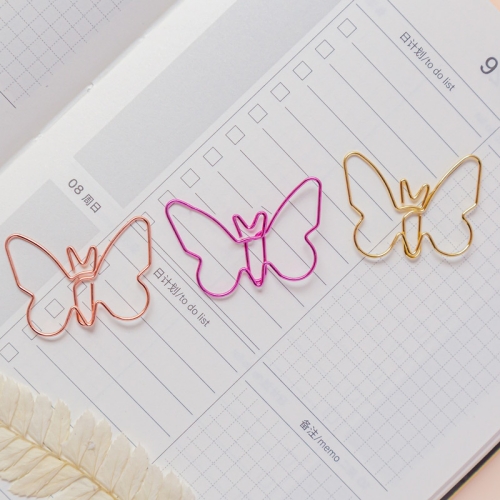 butterfly shaped paper clip with rose gold color envelope round ring